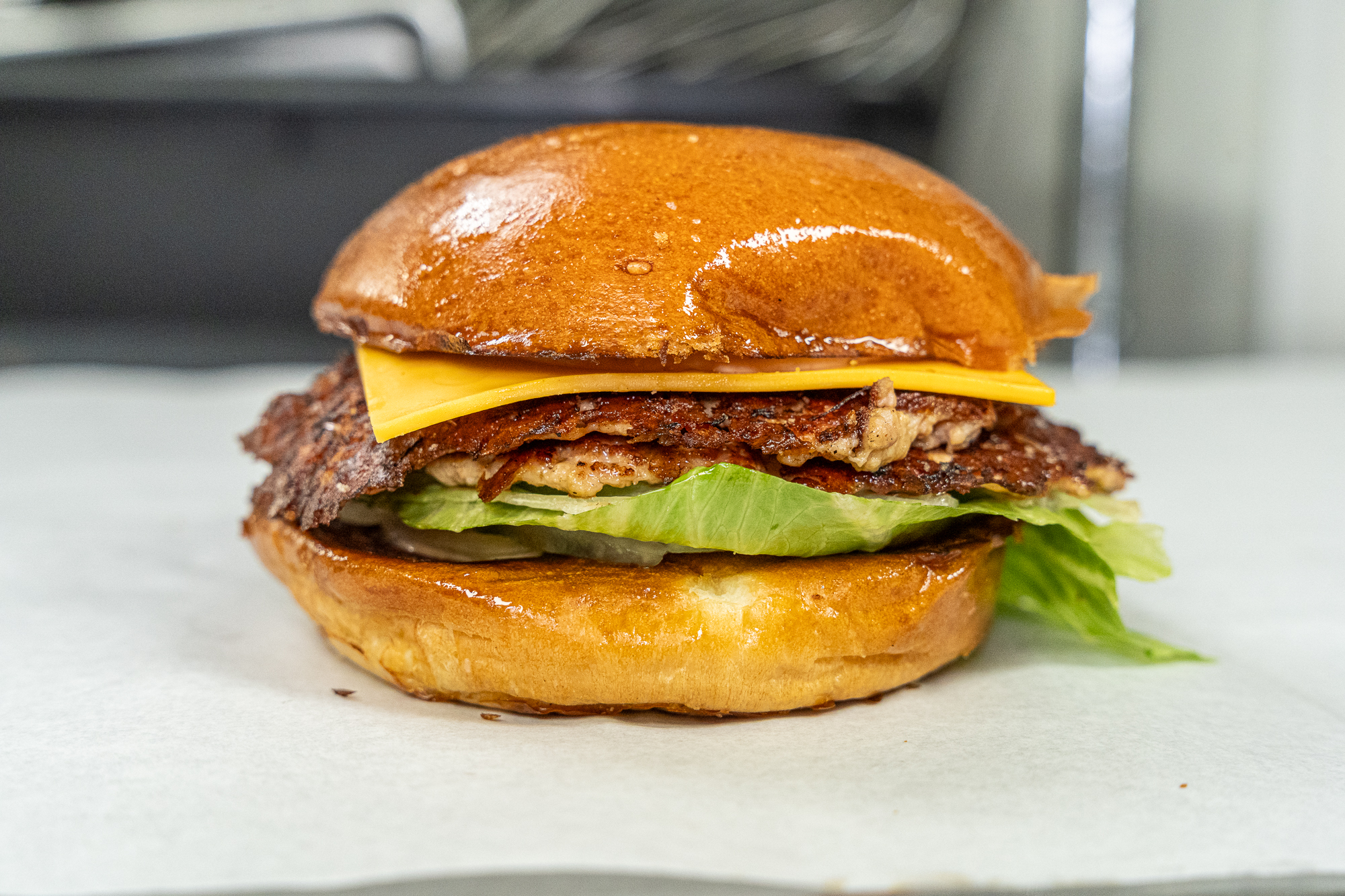 Turkey burger with lettuce, tomato, cheese, and pickles at StormBurger in Inglewood and Long Beach